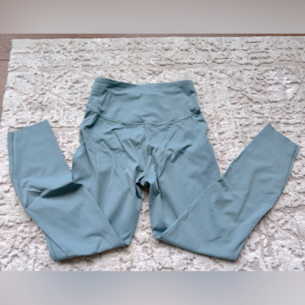 Lululemon leggings. Light gray/green in color.